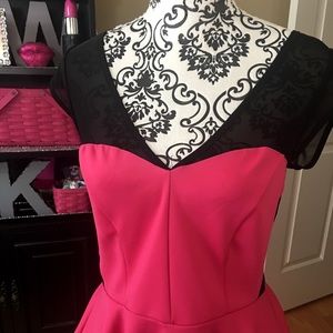 BEBE PINK MESH PEPLUM TOP SIZE LARGE